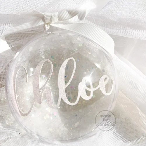 Snow ball christmas ornament with floating name