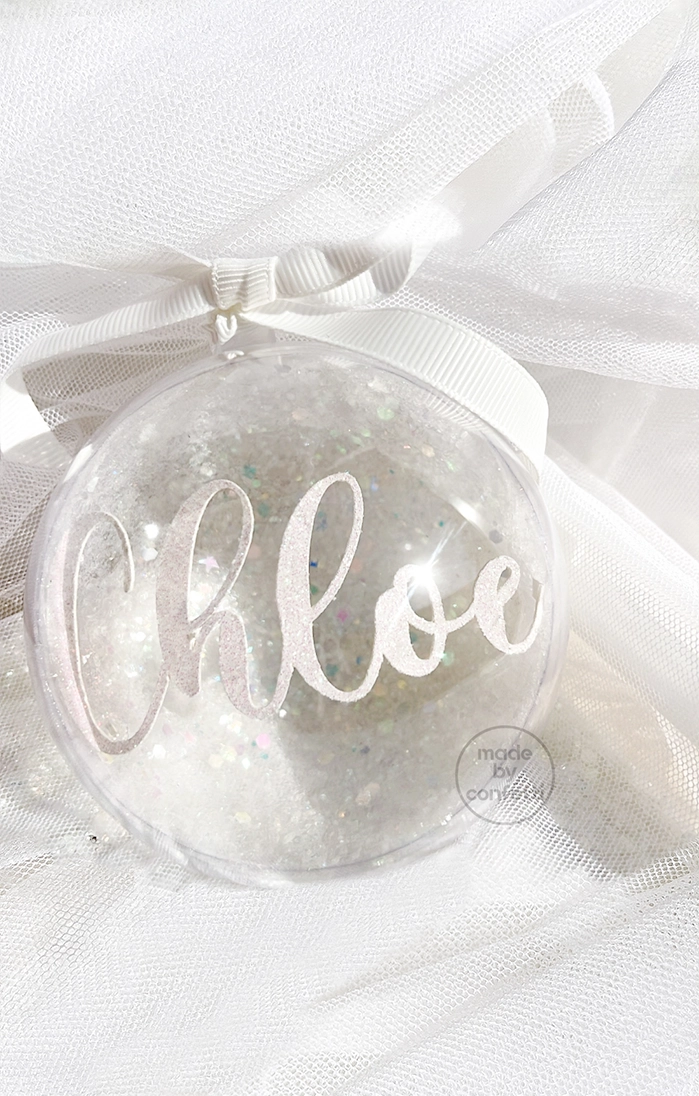 Snow ball christmas ornament with floating name