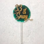 Sassy paddle cake topper